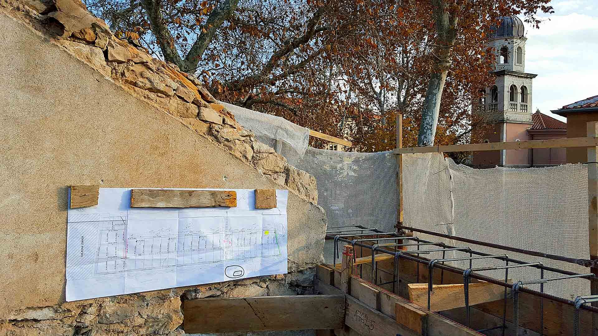 In 2016, a photo captured the future Almayer Hotel, revealing the structure devoid of its roof amidst the intricate reconstruction work on the cornice and roofing